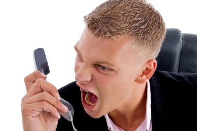 0101-angry_employee_shouting_on_phone.jpg