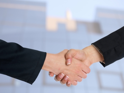 0132-handshaking_business_people.jpg