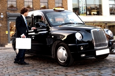 0385-businessman_interacting_with_taxi_driver.jpg