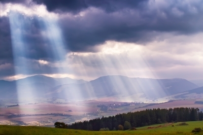 0397-sunlight_beams_over_clouds_in _mountains.jpg