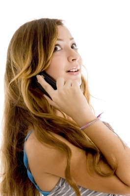 0451-teenage_girl_talking_over_mobile.jpg