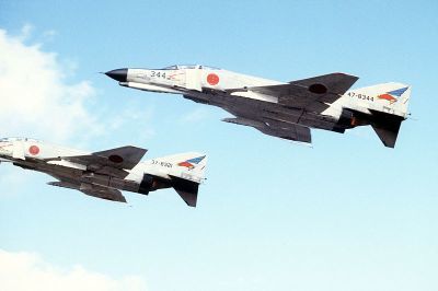 0517-f-4ej_(344&321)_of_302_sqn_fly_over_misawa_air_base.jpg